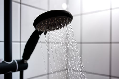 water-from-the-shower-in-the-modern-bathroom-2023-11-27-05-27-21-utc