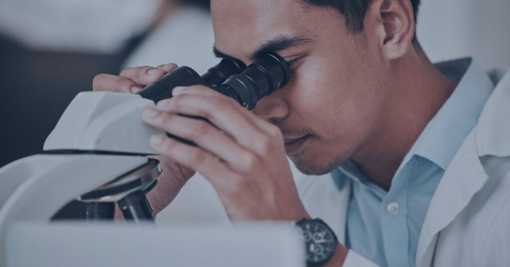 Scientist looking at biofilm