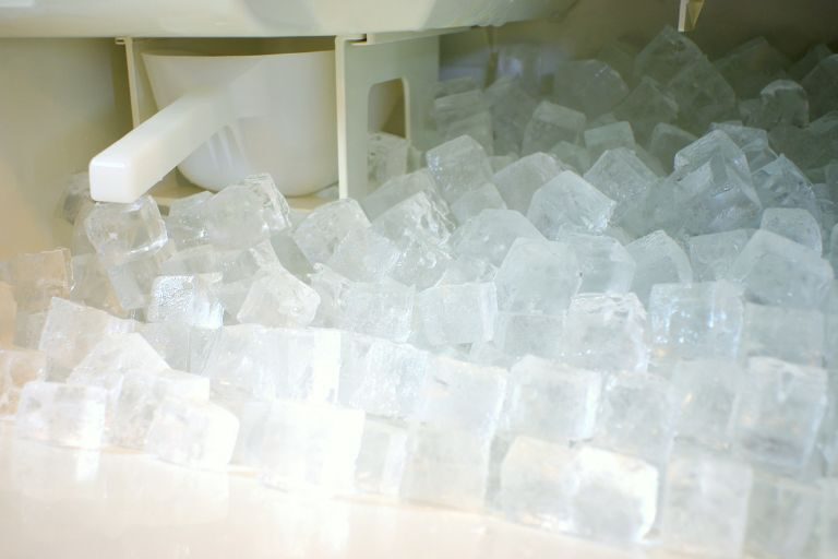 hotel-ice-machine-legionella-prevention A hotel ice machine. Ice machines can harbor Legionella bacteria when heat from compressors or nearby warm areas raises water temperatures inside the unit, creating conditions ideal for bacterial growth. The bacteria can survive freezing and cause infection when contaminated ice melts or is aspirated.